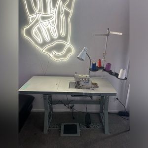 Juki MO-6714S Industrial 4-Thread Overlock w/ Table, Working Lamp And Pedals